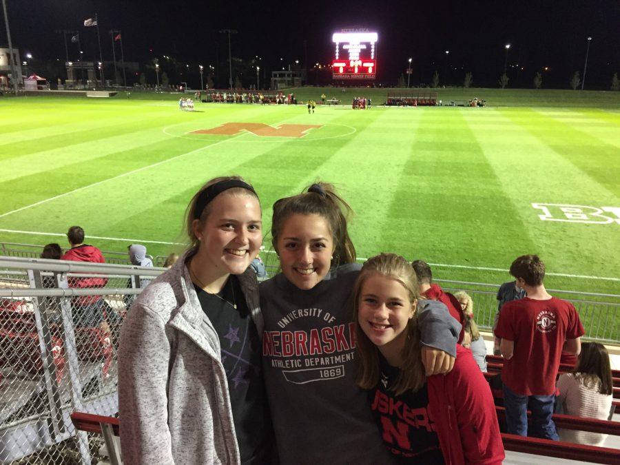 Senior Abby Smith and her younger sisters, junior Lexi Smith and Lauren Smith, pose at the University of Nebraska Lincoln's soccer complex. 