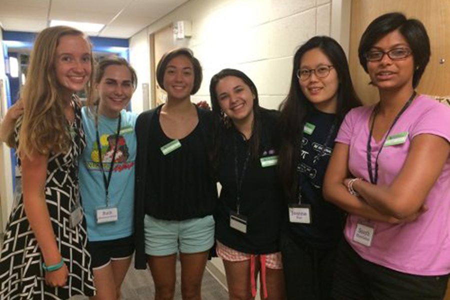 Meg Travis and fellow scholars Ruth Scholnick-Shur, Lauren Brady, Olivia Rauls, Joanne Kim and Saayli Khambekar congregate for a photo together in their dorm hall before dispersing for an afternoon activity June 19.