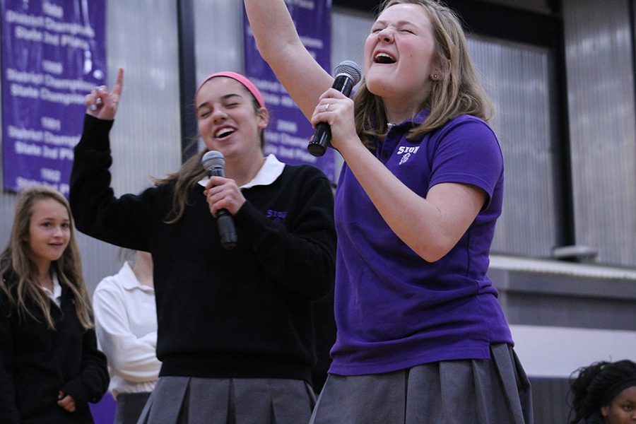 Freshmen Sophia Angrisano and Avery Kuhls belt out Food for Thought themed songs.