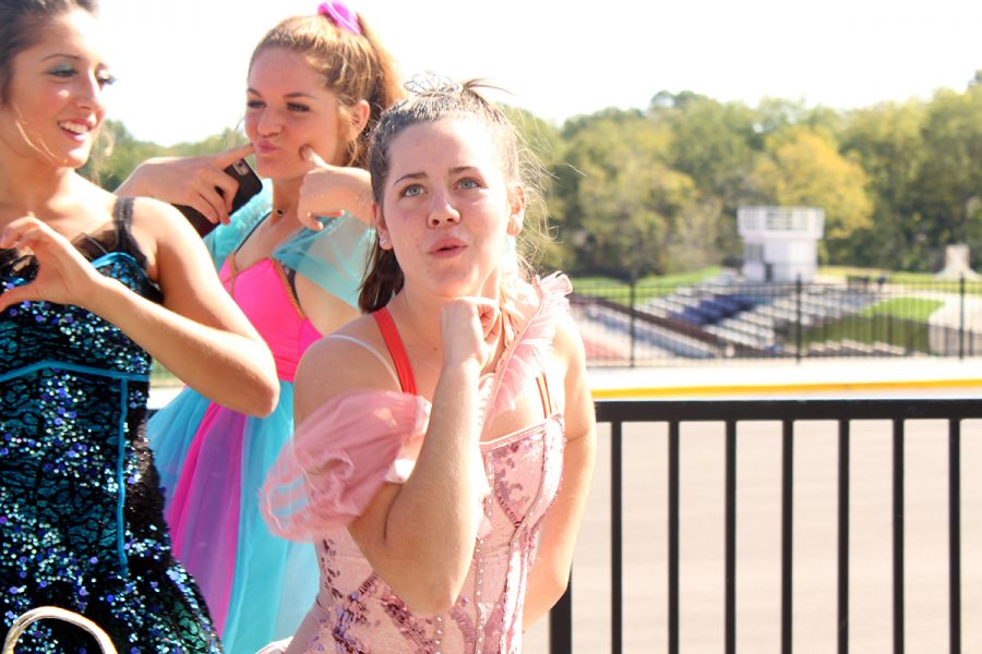 While outside for lunch, juniors Mary Evans, Aidan McEnerney and Megan Breckenridge try out their best “Toddlers and Tiaras” poses.