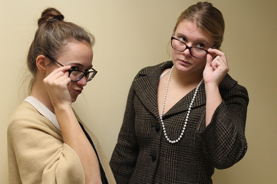 Juniors Maria Kindred and Melissa Hamilton pose for a photo in their business casual attire.