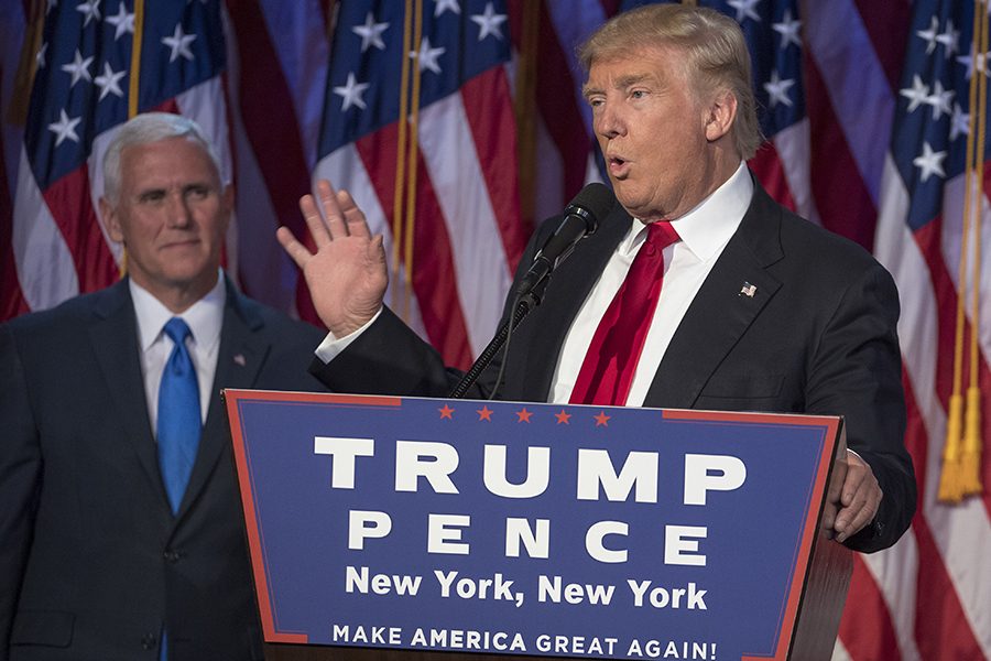 President-elect Donald Trump, joined on stage by running mate Mike Pence, speaks to supporters at the Election Night Party at the Hilton Midtown Hotel in New York City on Nov. 9.