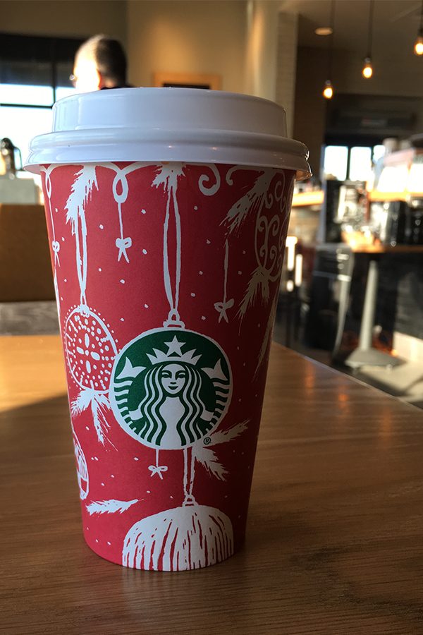 This year's Starbucks Holiday cups feature a variety of winter themes such as snow, christmas lights and ornaments. 