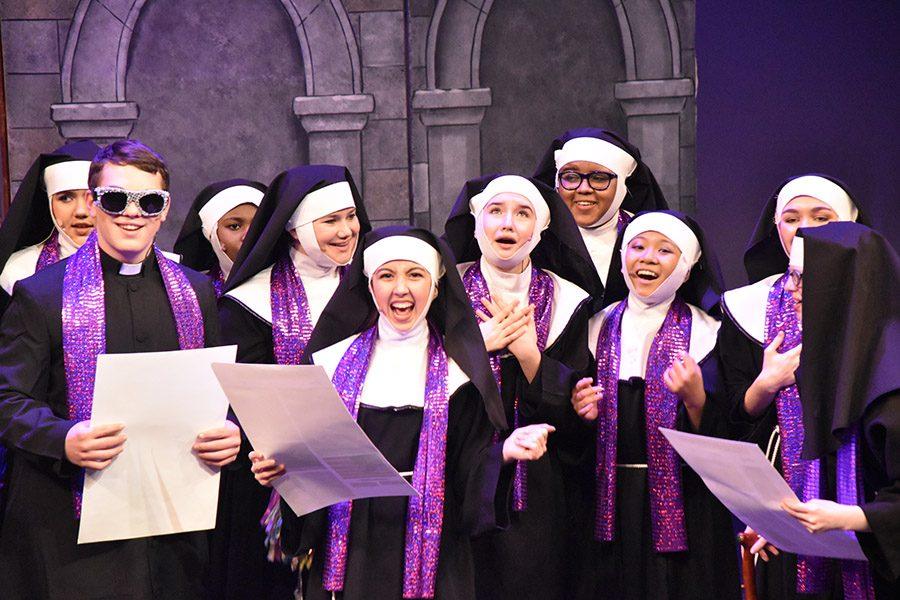 Monsignor (sophomore Nick Lynn), Sister Mary Cecilia (freshman Katie Dykeman), Sister Mary Patrick (senior Maria Arroyo), Sister Mary Michelle (freshman Peyton Wade), Sister Mary Martin of Tours (senior Jade Harvey) and Sister Mary Lucia (freshman Cara Hiatt) sing “Sunday Morning Fever” at the start of Act 2.