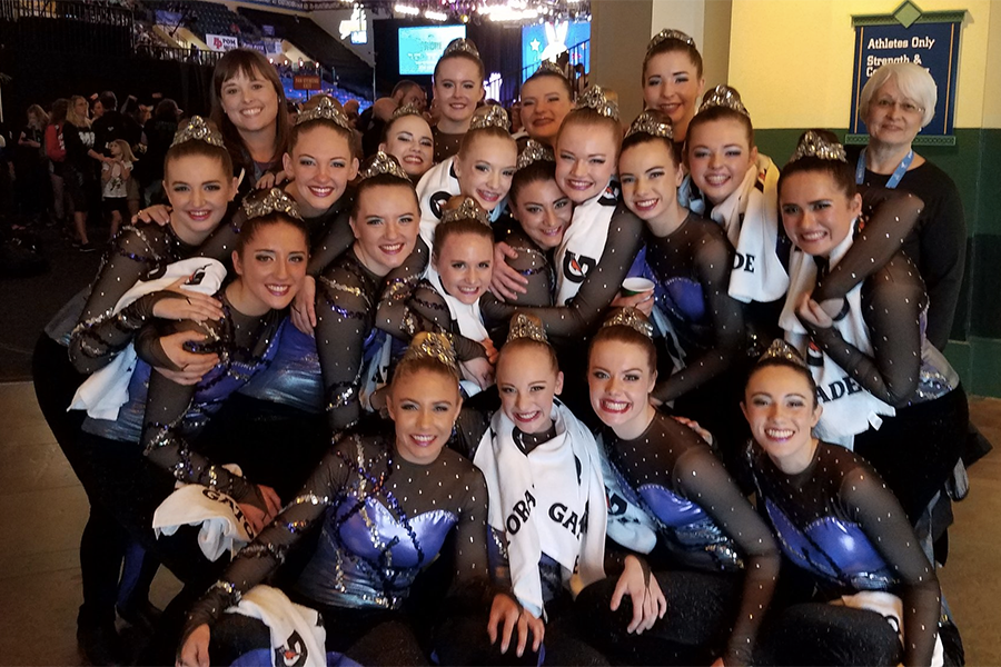 Dance team poses for a team photo right after their finals performance in Kick.