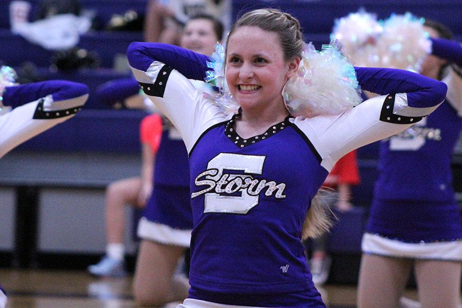 Freshman Shea Sullivan performs during halftime with dance team.