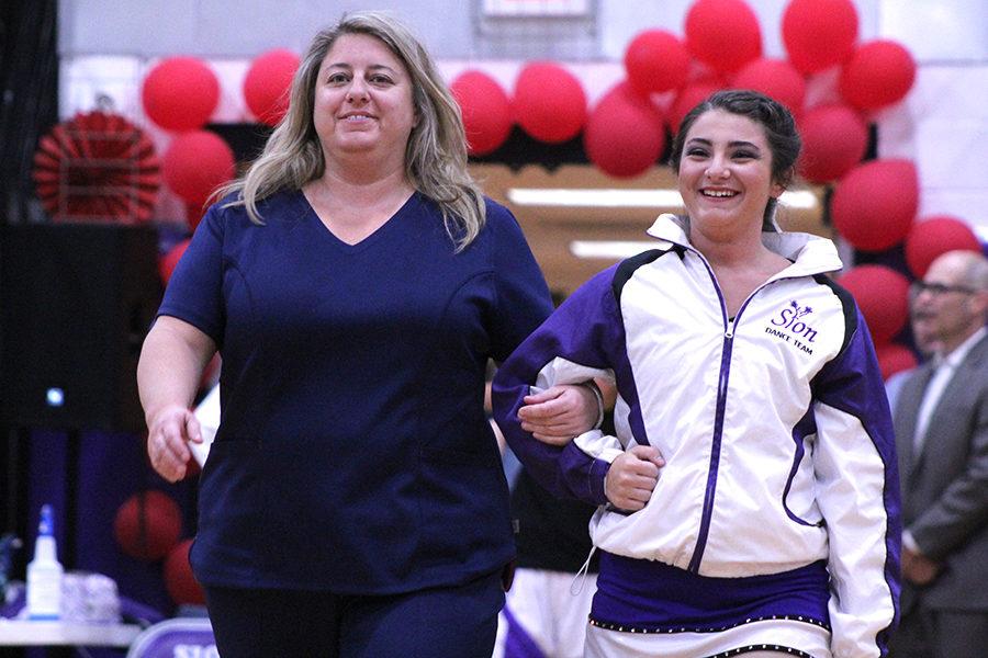 Senior Jessica Cloughley was honored for her commitment to dance team with her mother by her side.