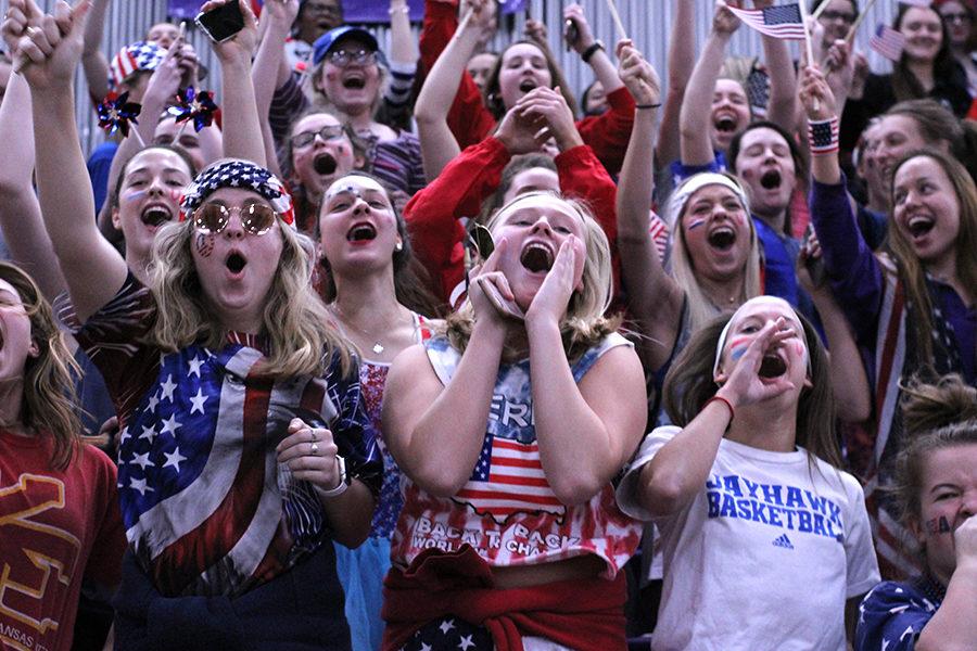 The senior student section cheers after seeing the senior class dance.