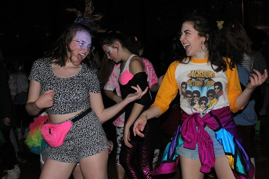 Seniors Maddi McMaster and Morgan Ciocca dance around at the their last MORP.