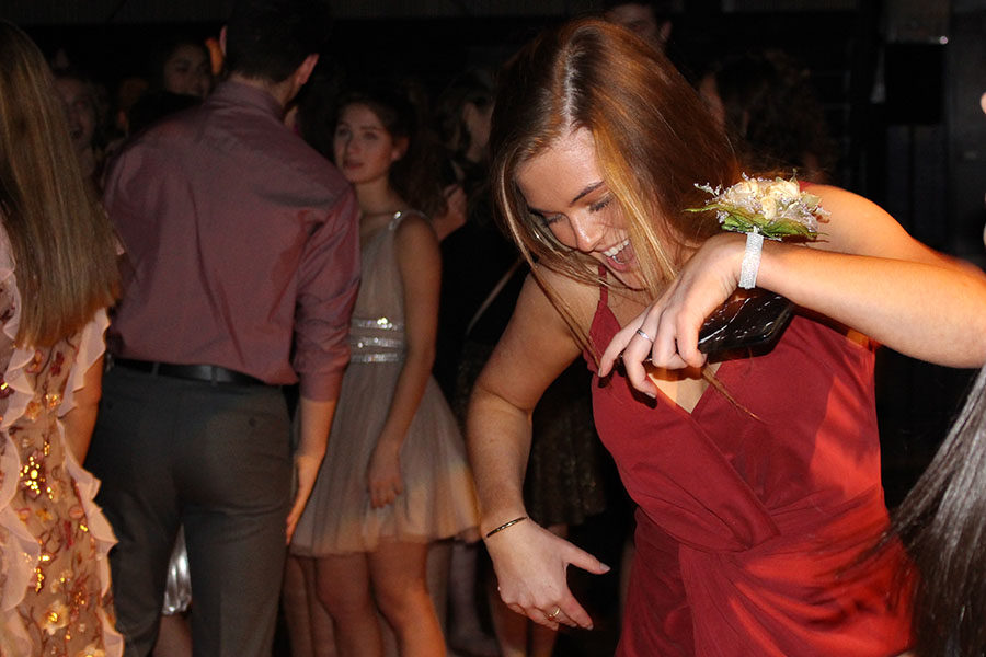 Junior Keali Myrick shows off her best moves at the winter formal Dec. 2.