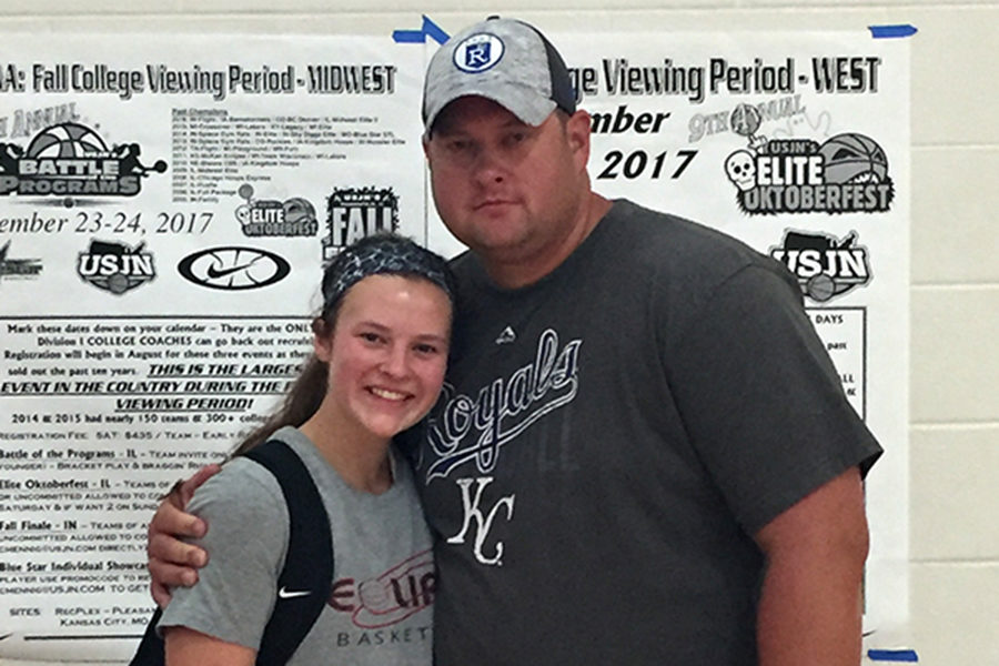 Senior Varsity Basketball Co-Captain Mariah Lynn  with her father and Freshman Basketball Coach Chad Lynn pose for a picture after Lynn’s last Amateur Athletic Union Basketball tournament in Denver July 2017.