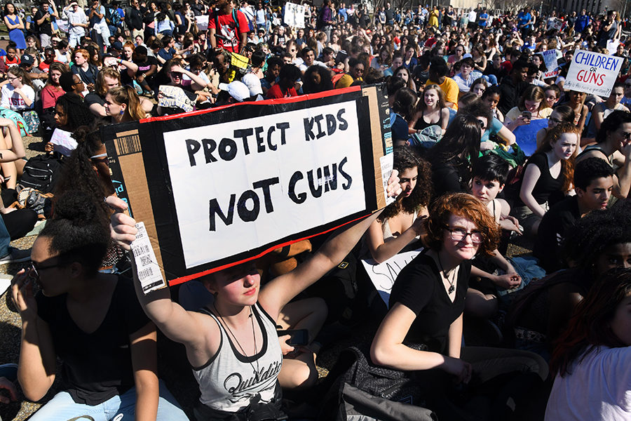 Hundreds of high school and middle school students gather in front of the White House in support of gun control in the wake of the Florida shooting, Wednesday, Feb. 21.