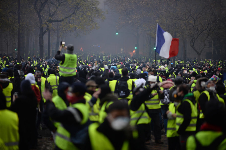 Yellow vests (Gilets jaunes) protest against rising oil prices and living costs on the Champs Elysees in Paris, France, on Dec. 1, 2018. Thousands of anti-government protesters are expected today on the Champs-Elysees in Paris, a week after a violent demonstration on the famed avenue was marked by burning barricades and rampant vandalism that President Emmanuel Macron compared to "war scenes." (Eliot Blondet/Abaca Press/TNS)