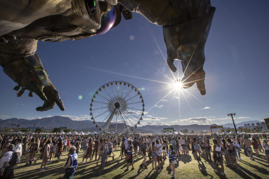 A hand of "The Astronaut" looms over the festival grounds during opening day at the Coachella Valley Music and Arts Festival on the Empire Polo Club grounds in Indio, Calif., on Friday, April 12, 2019. (Brian van der Brug/Los Angeles Times/TNS)