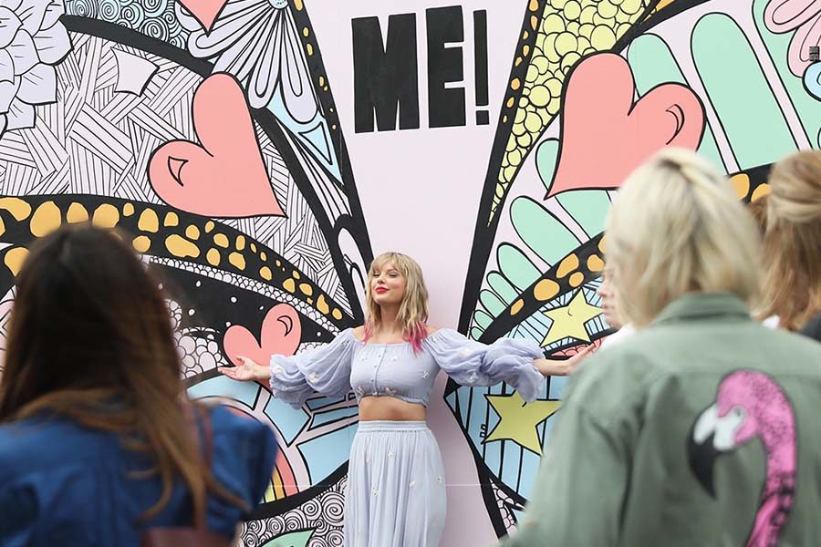 In advance of her new song release, Taylor Swift surprises fans at the new Kelsey Montague "What Lifts You Up" Mural on April 25, 2019 in Nashville, Tenn. Swift commissioned the mural and put clues about her upcoming new music in the piece. (Leah Puttkammer/Getty Images/TNS)