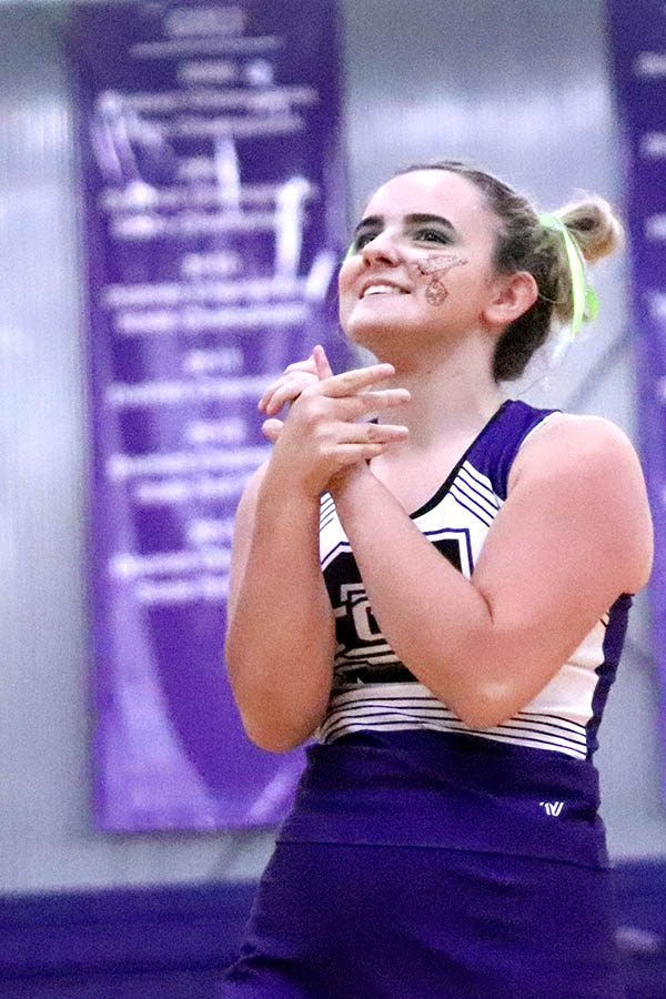 Junior cheerleader Sophia Allen teaches the chant “N-D-S the best!” to students at the pep assembly on Sep.10. 