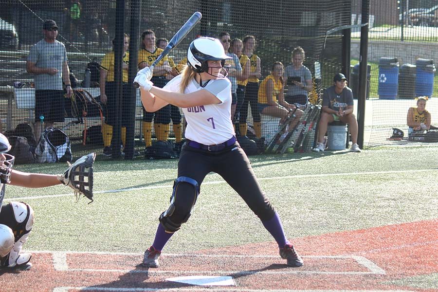 Junior Sharon Kramschuster winds up to bat in the top of the third inning during the game at St. Teresa's Academy Sept. 18. Varsity lost 10-0.