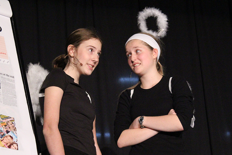 Freshmen Ellie Meredith and Lauren Millard performed as angels Raquel and Michaela in "Have You Seen Down There Lately?" at Night of One Acts Oct. 9. 