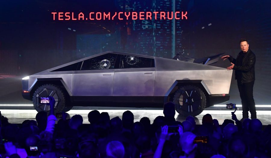 Tesla co-founder and CEO Elon Musk gestures while wrapping up his presentation of the newly unveiled all-electric battery-powered Tesla Cybertruck at Tesla Design Center on Nov. 21, 2019 in Hawthorne, Calif. 