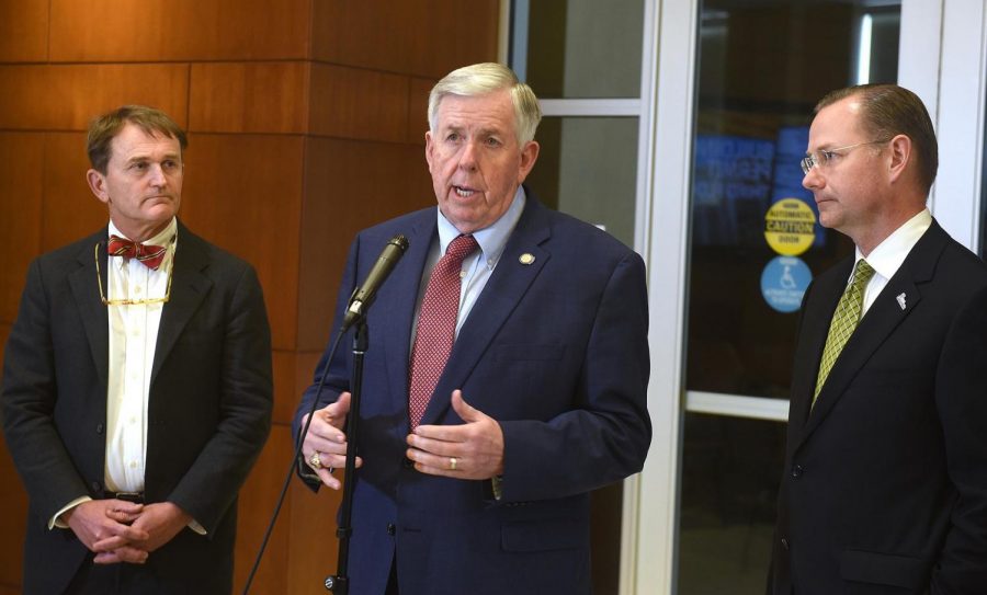 Gov. Mike Parson, center, Missouri health director Randall Williams, left, and Mayor Brian Treece talk to the media during a press conference at City Hall in early March on the state's strategy for the coronavirus.