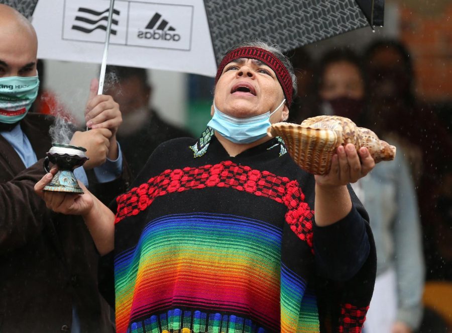 Susana Angelica Ollin Kuikatl Banuelos recites a prayer at a celebration for Indigenous Peoples Day in Chicago on Oct. 12, 2020.