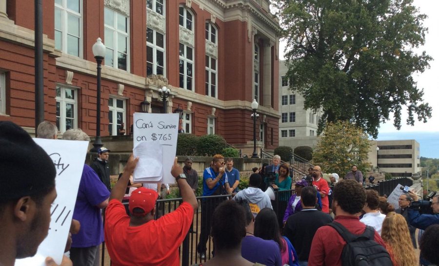 Missouri citizens rally outside of Missouri state capitol building in Jefferson City, MO in support of raising the minimum wage.