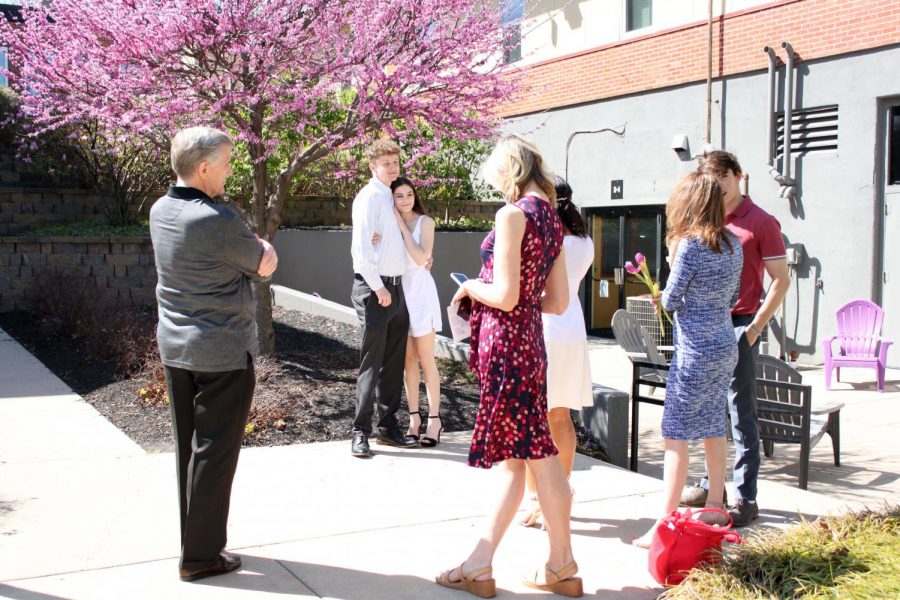 Senior Aly Heefner gathers outside with her family after the ring ceremony. 