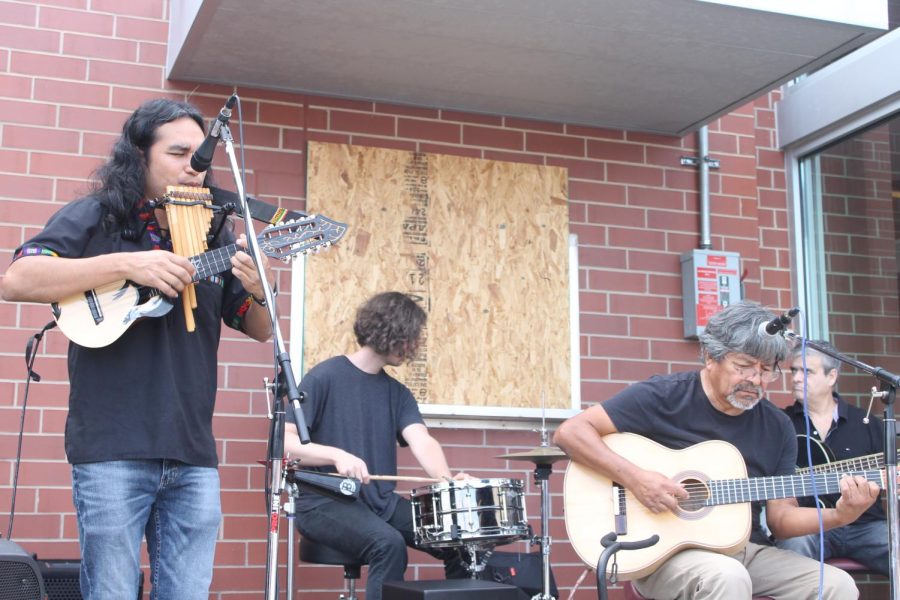 The Hispanic band "Ayllu" adds joyful music to the celebration as they perform for the school in the circle drive.