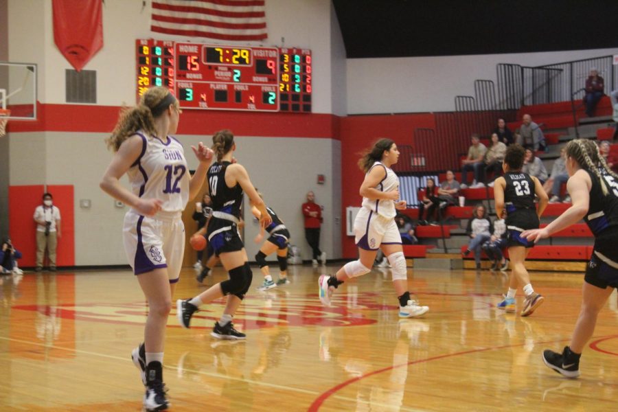 Junior Makayla Herbert runs across the court. 