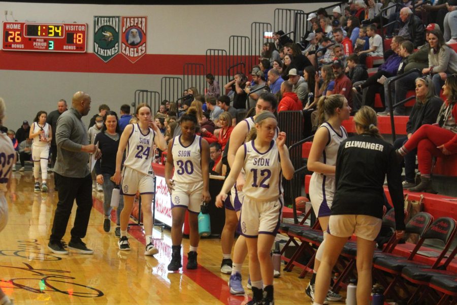 During a time-out, the team takes a breath and rests. 