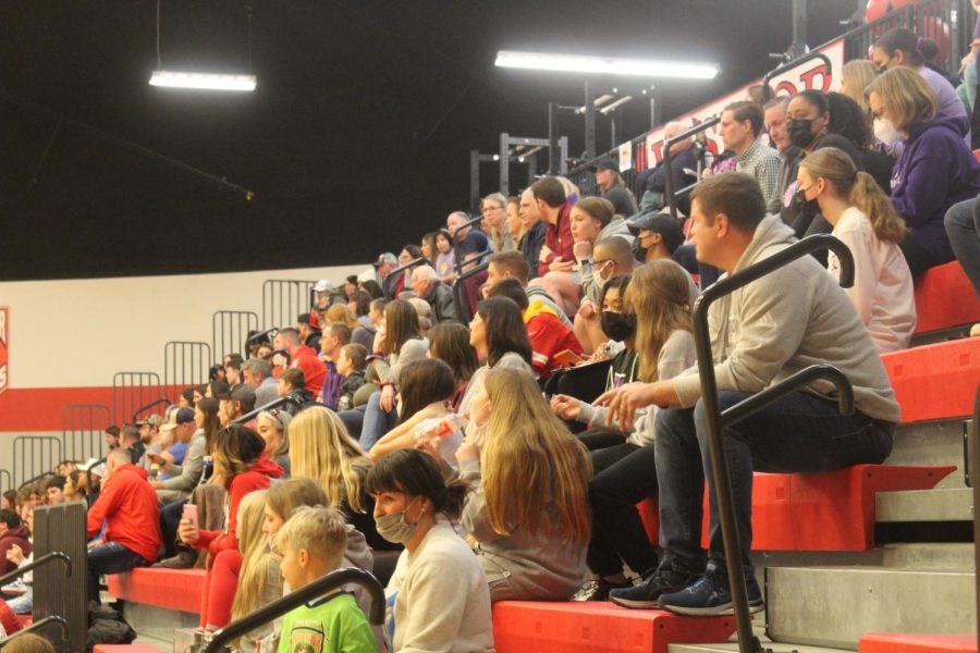 The crowd at Archie High School patiently watch the game play out. 