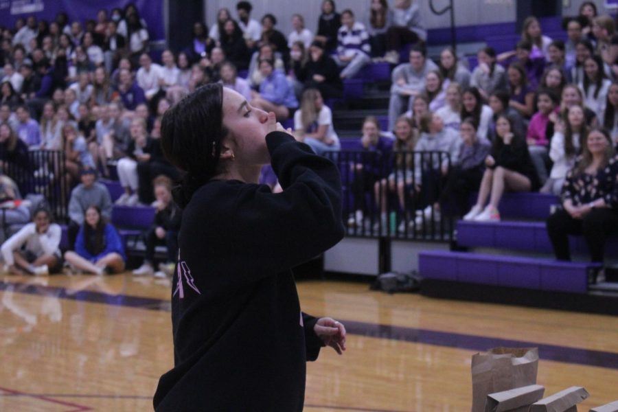 Senior Sophia Totta tries to swallow whatever food she had to eat for the round of competition. 