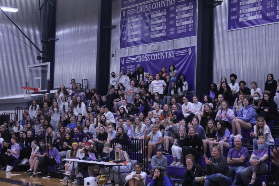 The grades scream their lungs out cheering on their classmates.