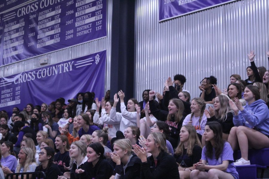 The classes cheer on their classmates. 