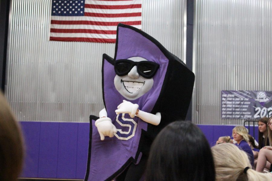 School mascot, Stormy dances during the fall sports pep rally 