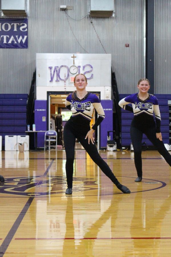 Junior Livvy Cavaliere poses during the dance team's kick performance 