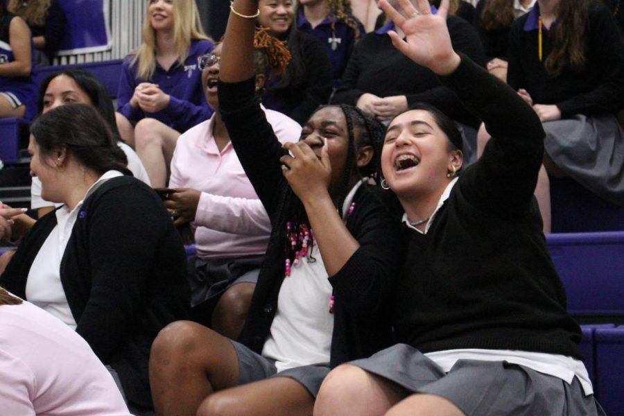 Seniors Chrissa Wilburn and Samy Mora-Cuevas laugh with excitement during the pep rally 