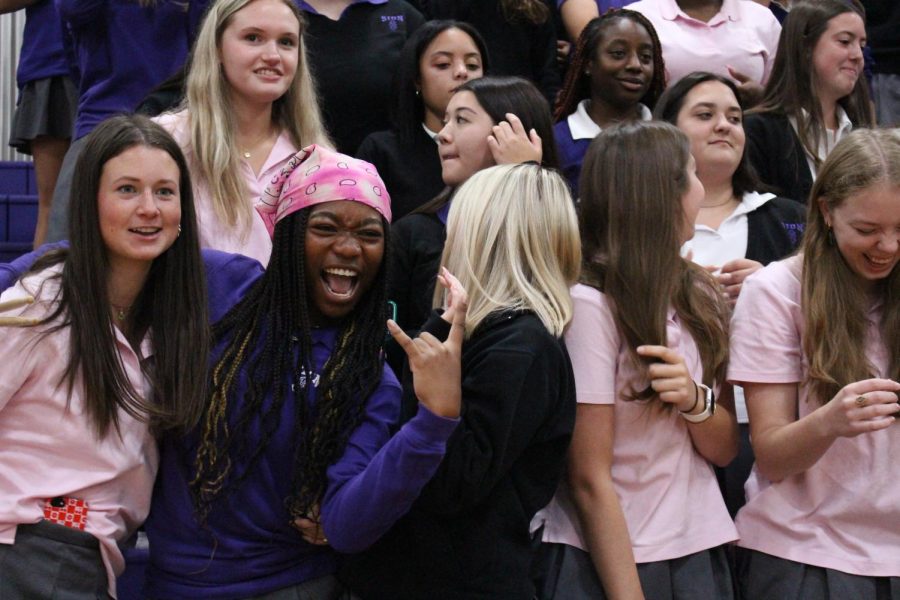 Seniors Bridget McDaniel and Makaila Traylor pose for a photo during Thursday's pep rally 