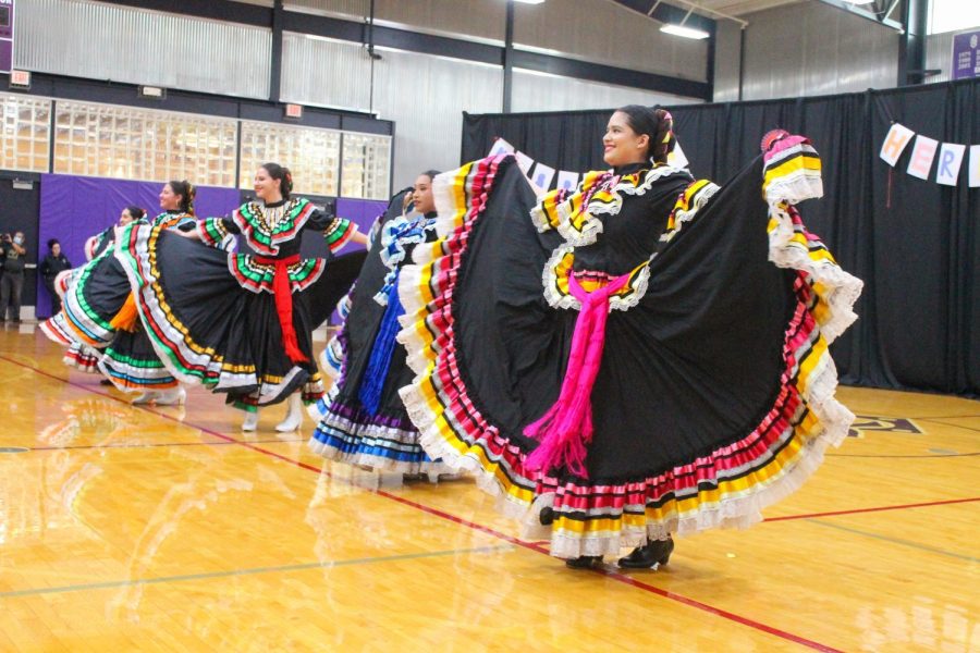 Dancers from folklórico group Grupo Folklórico Izcalli perform for students at the Hispanic Heritage celebration Sept. 22.