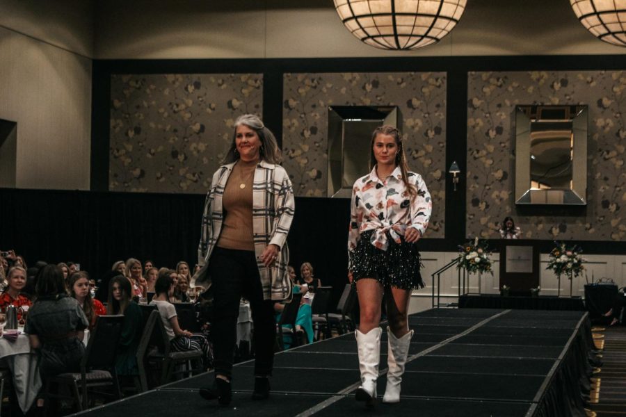 Senior Lauren Smith and her mom Linda Smith strut their stuff.