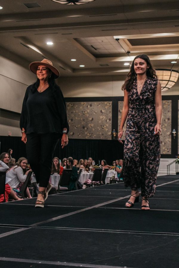 Senior Isabel Dumsky and her mom Rocio Dumsky strut down the runway.